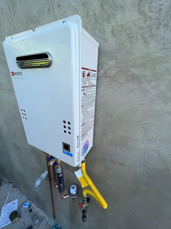 Tankless water heater installation for Camp Resolute homes
